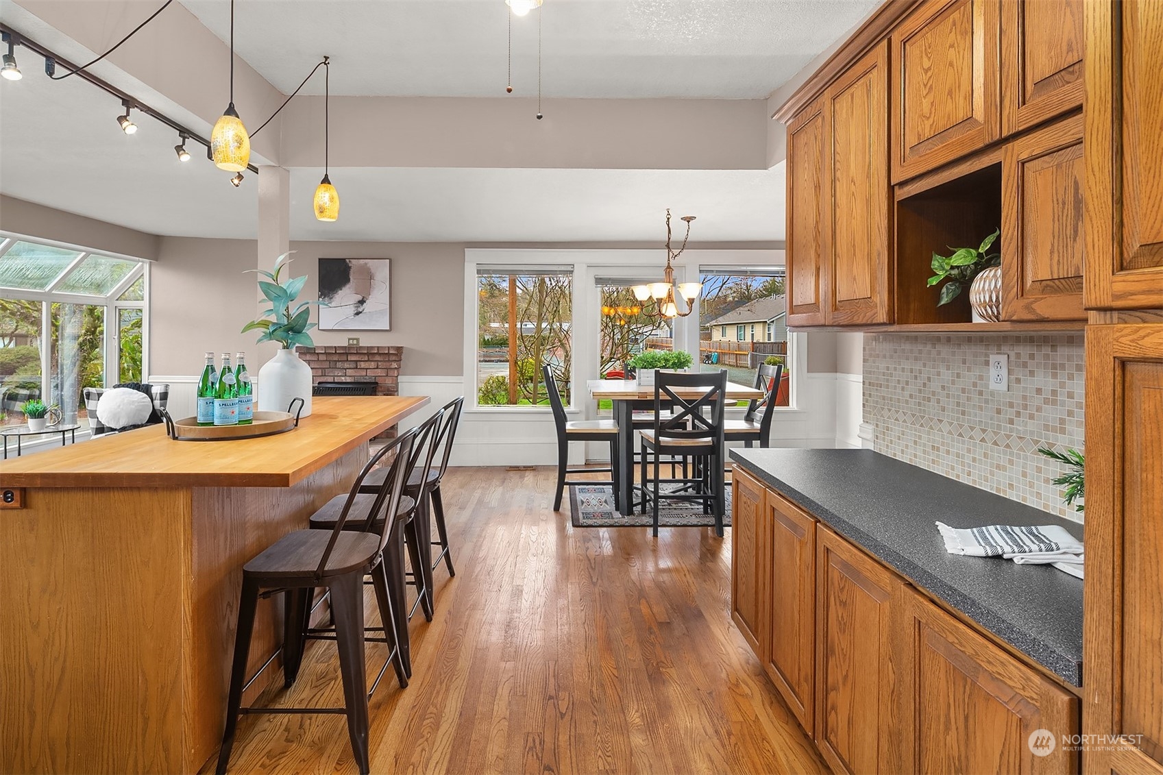 705 3rd Street Sultan, WA 98294 - Photo 5 of 26 a view of a dining room with furniture window and wooden floor