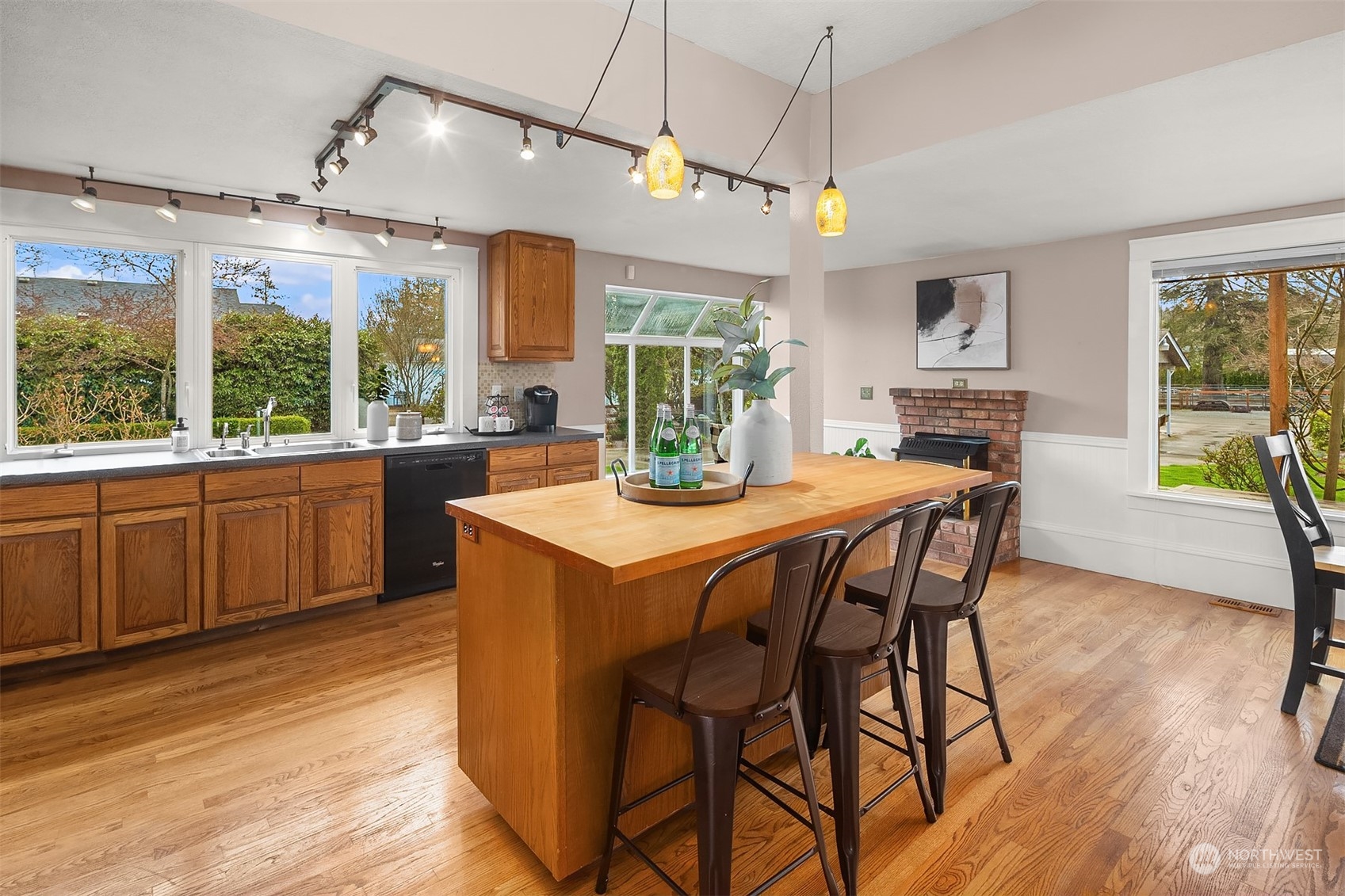 705 3rd Street Sultan, WA 98294 - Photo 6 of 26 a kitchen with a table chairs and wooden floor
