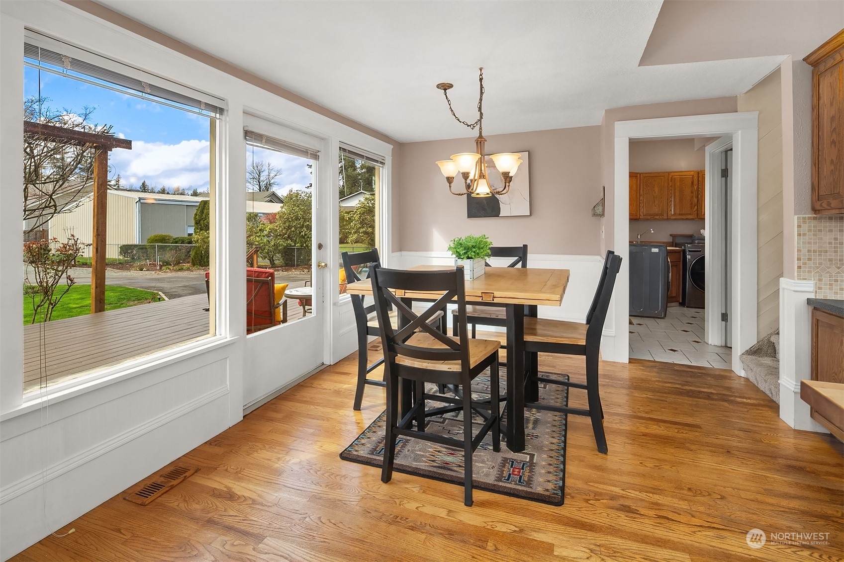 705 3rd Street Sultan, WA 98294 - Photo 8 of 26 a view of a dining room with furniture window and wooden floor