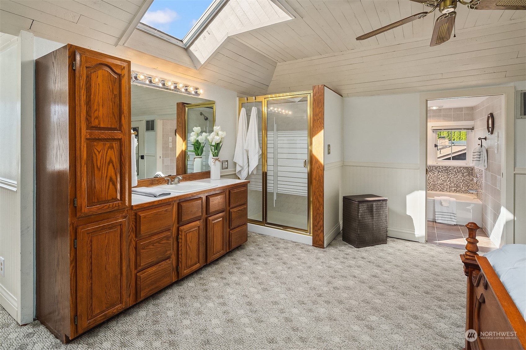 705 3rd Street Sultan, WA 98294 - Photo 10 of 26 a bathroom with a granite countertop sink and a mirror