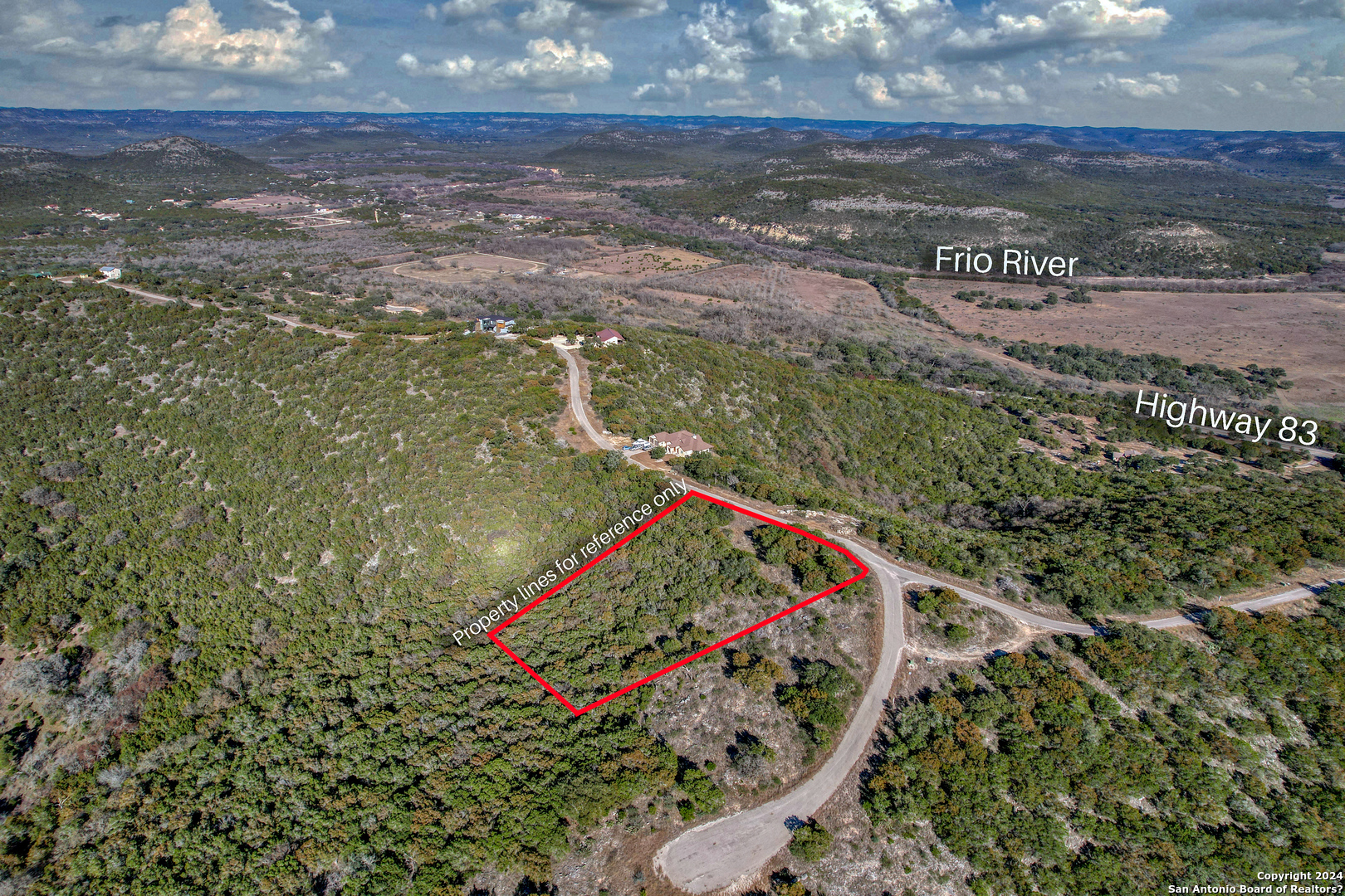 558 South Ridge Drive Concan, TX 78838 - Photo 2 of 35 a view of an outdoor space with a lake view