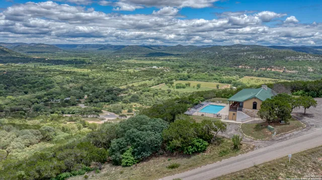 a view of a yard with an outdoor space