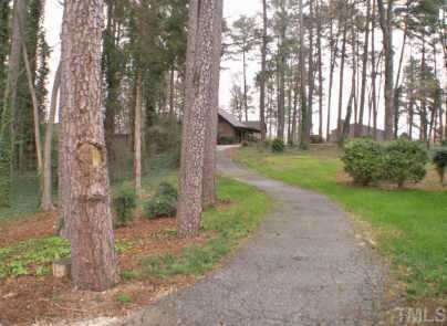5010 Flint Ridge Place Raleigh, NC 27609 - Photo 3 of 12 Walking trail to lake