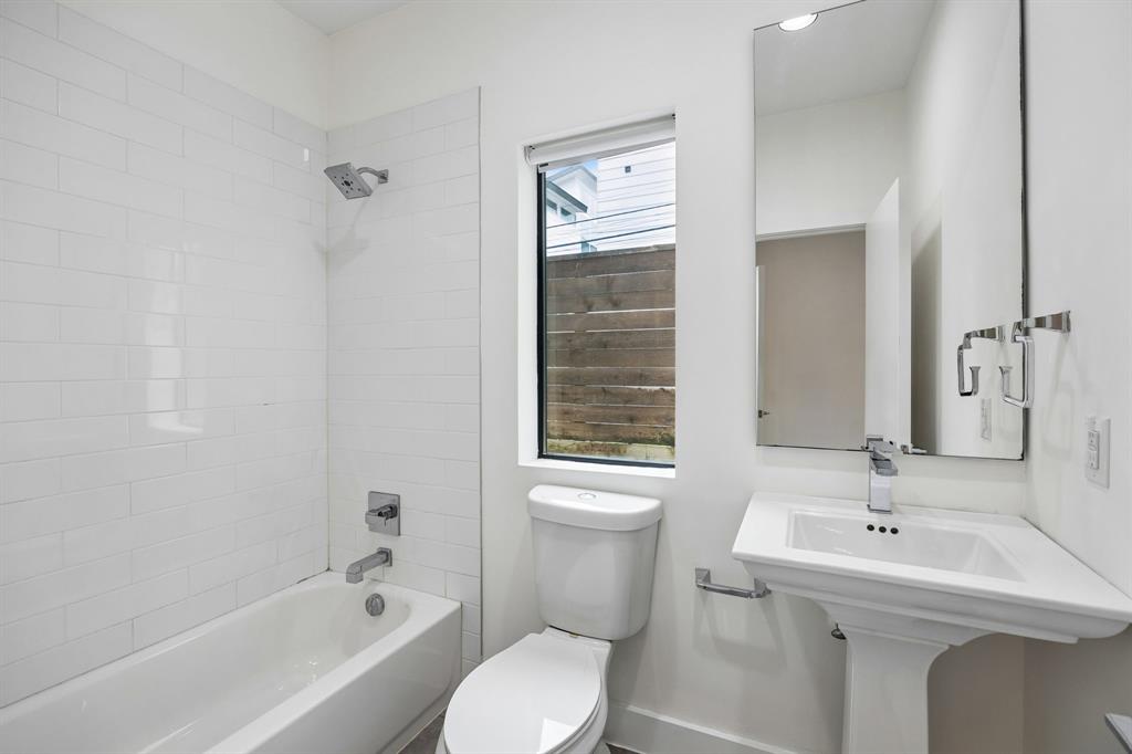 1851 Summit Avenue, Unit 4 Dallas, TX 75206 - Photo 4 of 29 a bathroom with a sink toilet and shower