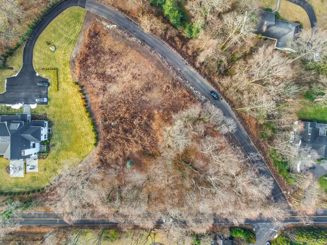 a view of a backyard of the house