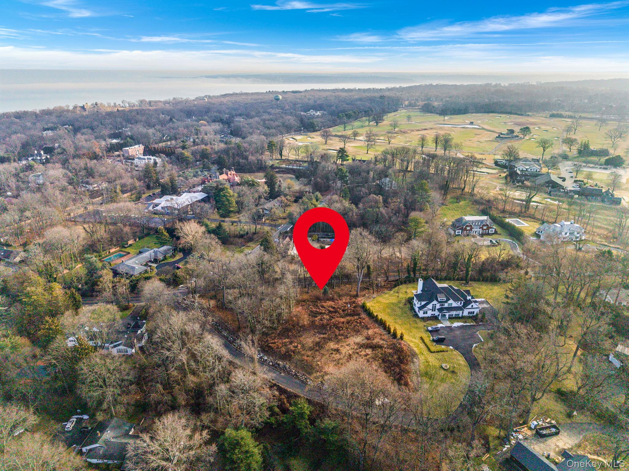 36 Cow Neck Road Sands Point, NY 11050 - Photo 9 of 18 a view of a city