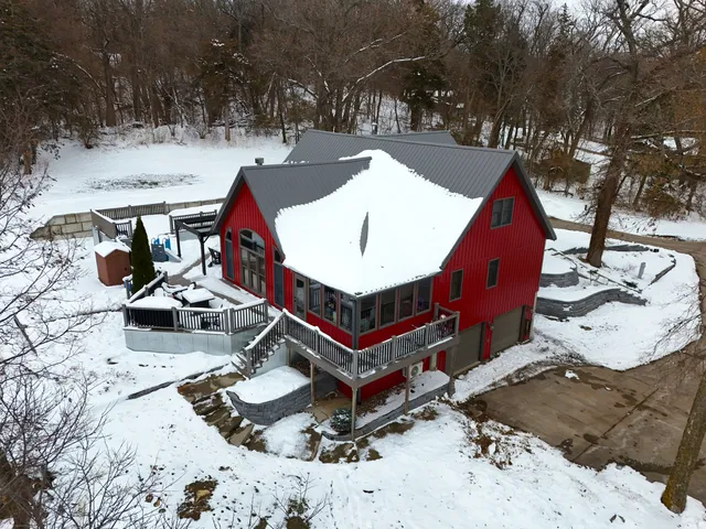 a view of house with a yard