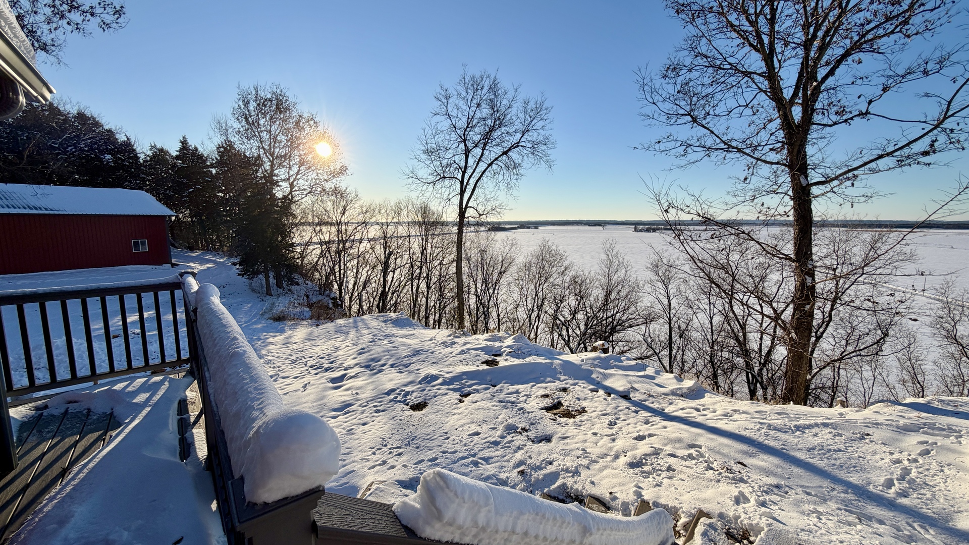 9120 Spring Valley Road Fulton, IL 61252 - Photo 14 of 59 a view of a backyard with a iron fence