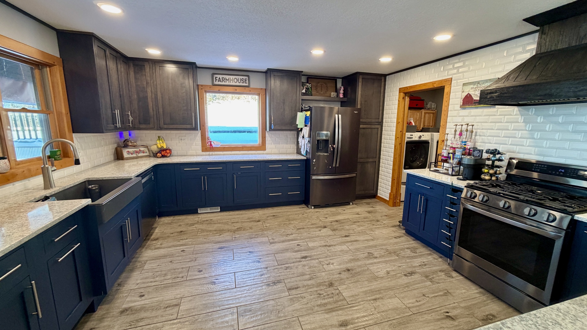 9120 Spring Valley Road Fulton, IL 61252 - Photo 21 of 59 a kitchen with stainless steel appliances granite countertop wooden cabinets a sink dishwasher a stove and a refrigerator