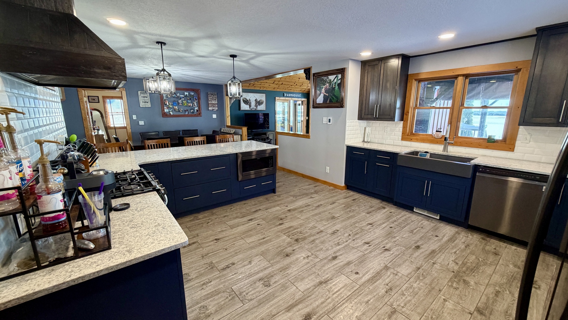 9120 Spring Valley Road Fulton, IL 61252 - Photo 22 of 59 a kitchen with stainless steel appliances granite countertop sink stove and refrigerator