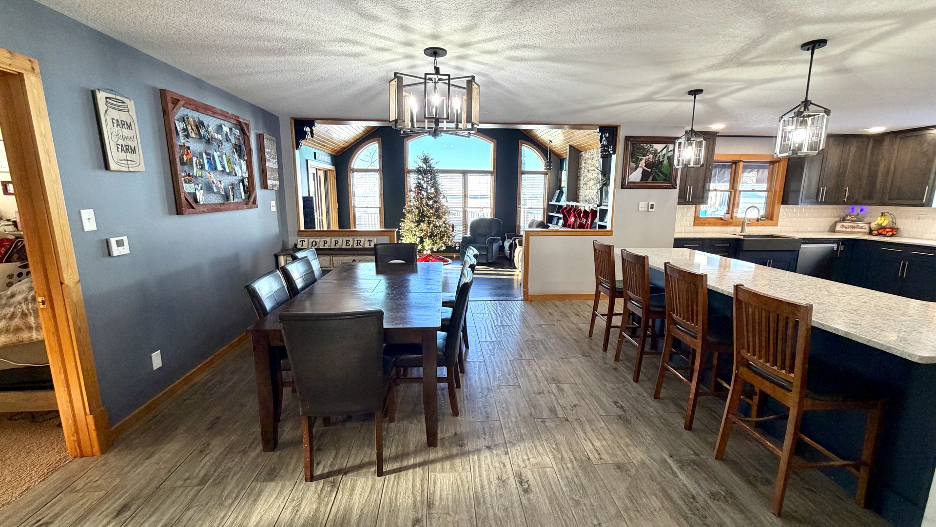 9120 Spring Valley Road Fulton, IL 61252 - Photo 25 of 59 a view of a dining room with furniture window and wooden floor