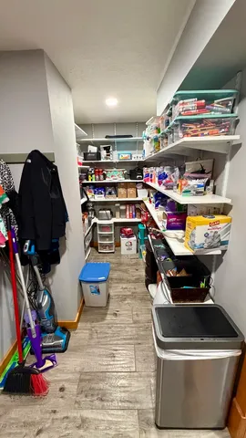 a view of bathroom with shower and wooden floor