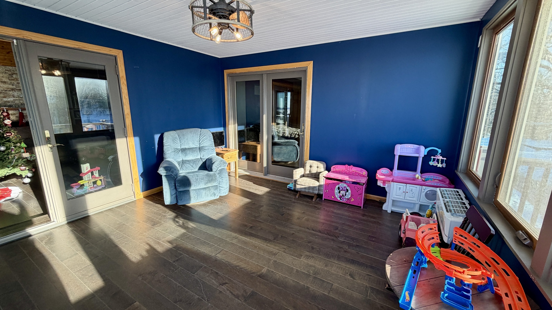 9120 Spring Valley Road Fulton, IL 61252 - Photo 30 of 59 a living room with furniture and a flat screen tv