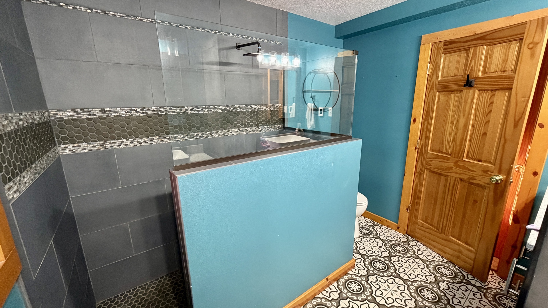 9120 Spring Valley Road Fulton, IL 61252 - Photo 33 of 59 a view of bathroom with shower and wooden floor