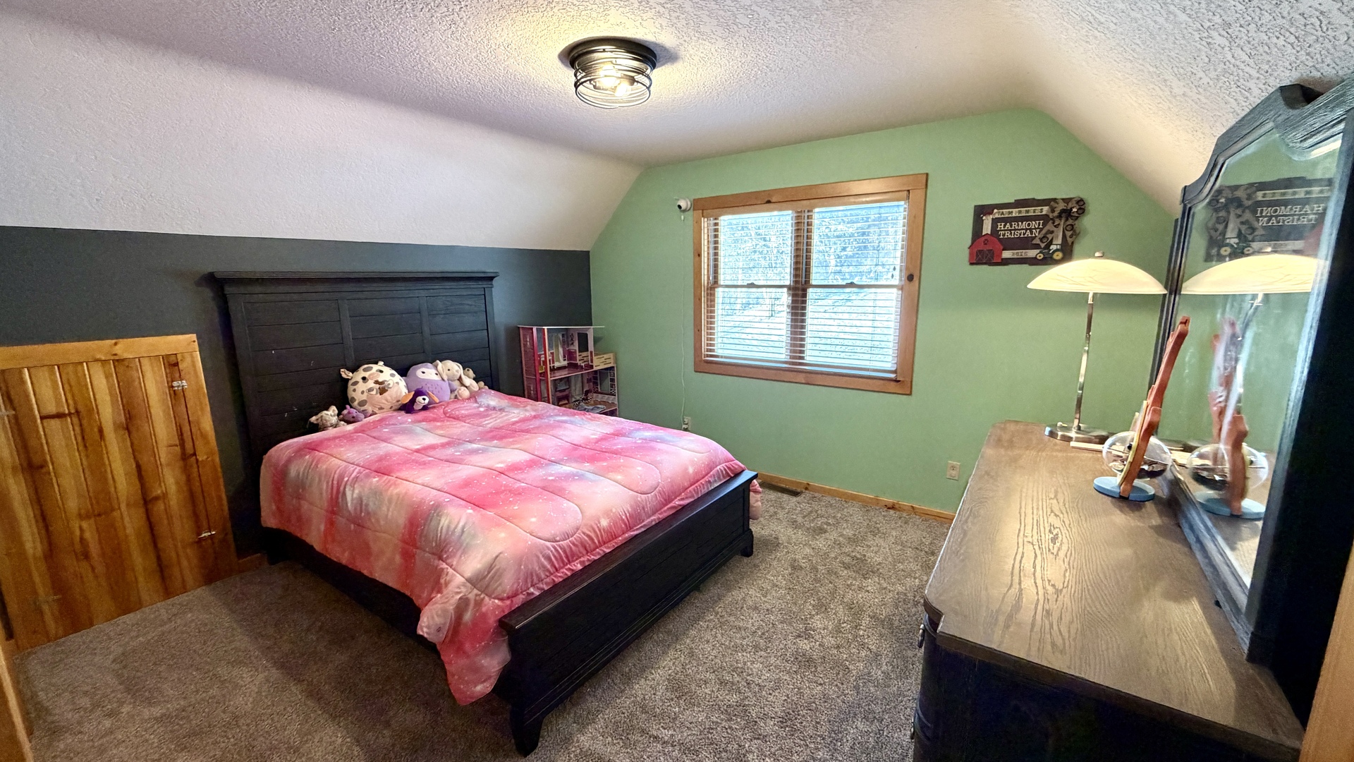 9120 Spring Valley Road Fulton, IL 61252 - Photo 34 of 59 a bed sitting in a bedroom next to a window