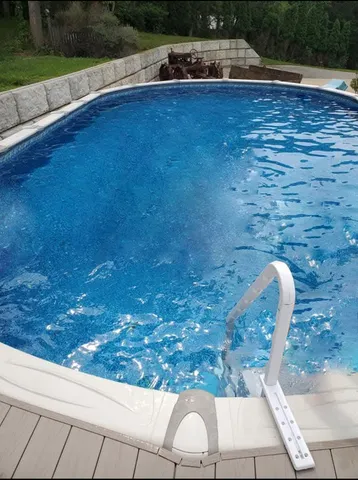 a view of a yard with a tree