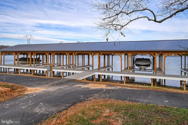 a view of swimming pool with seating space
