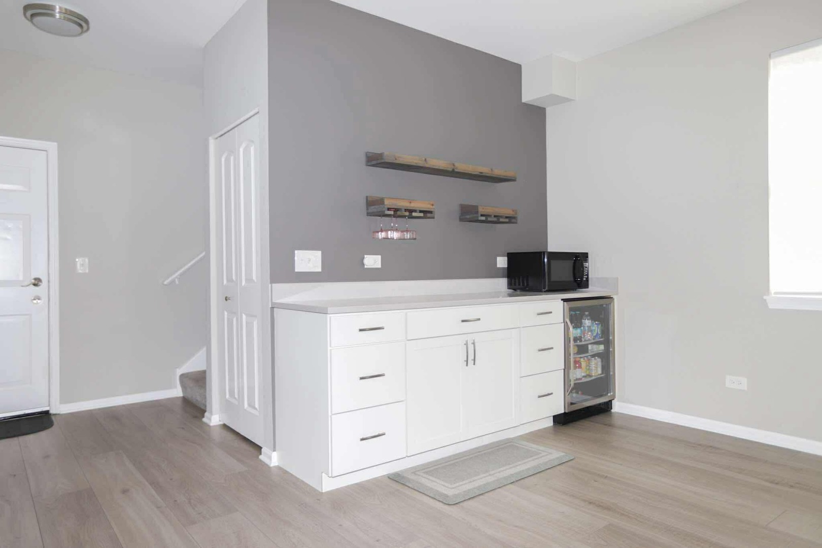 1117 Draper Road, Unit 1117 McHenry, IL 60050 - Photo 14 of 16 a room with a dresser and a mirror