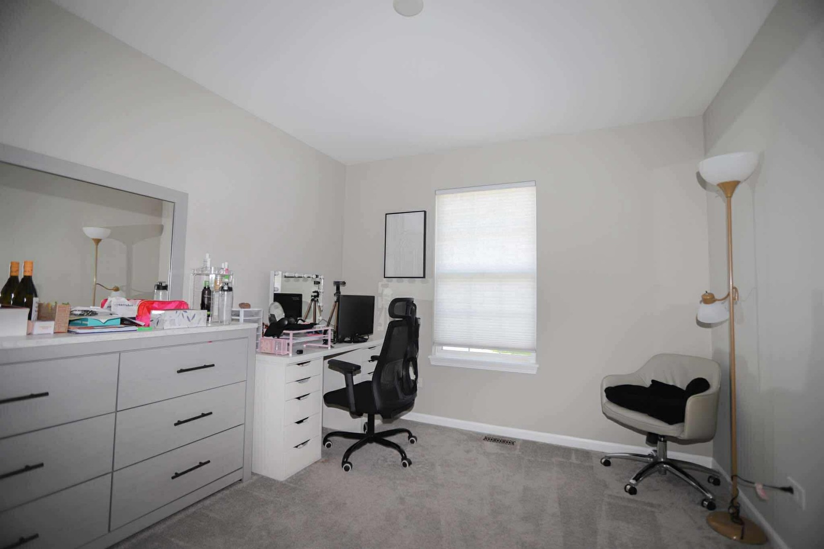 1117 Draper Road, Unit 1117 McHenry, IL 60050 - Photo 10 of 16 a view of a workspace with furniture and a window