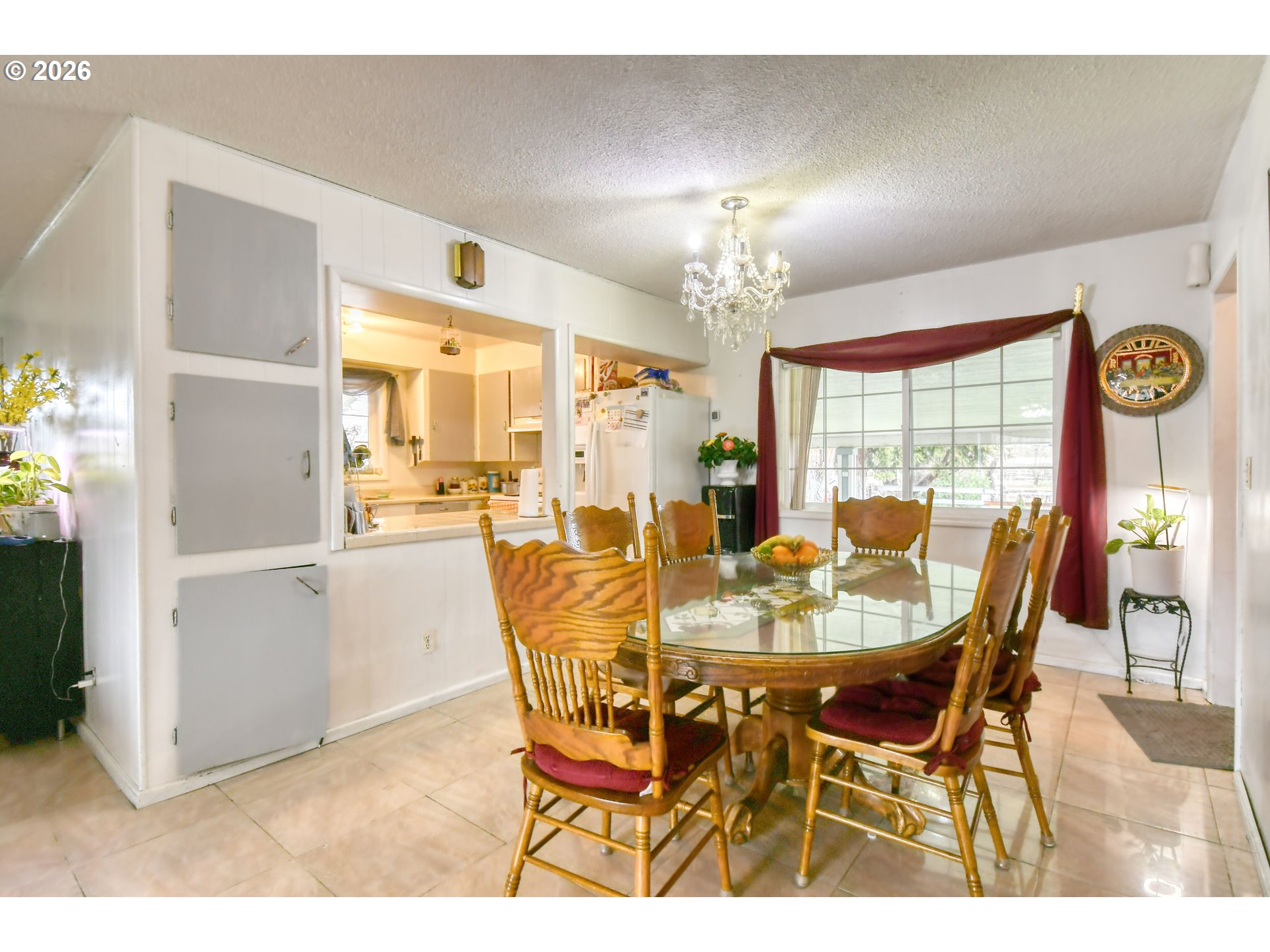 32611 Baxter Road Hermiston, OR 97838 - Photo 13 of 46 a view of a dining room with furniture and a chandelier