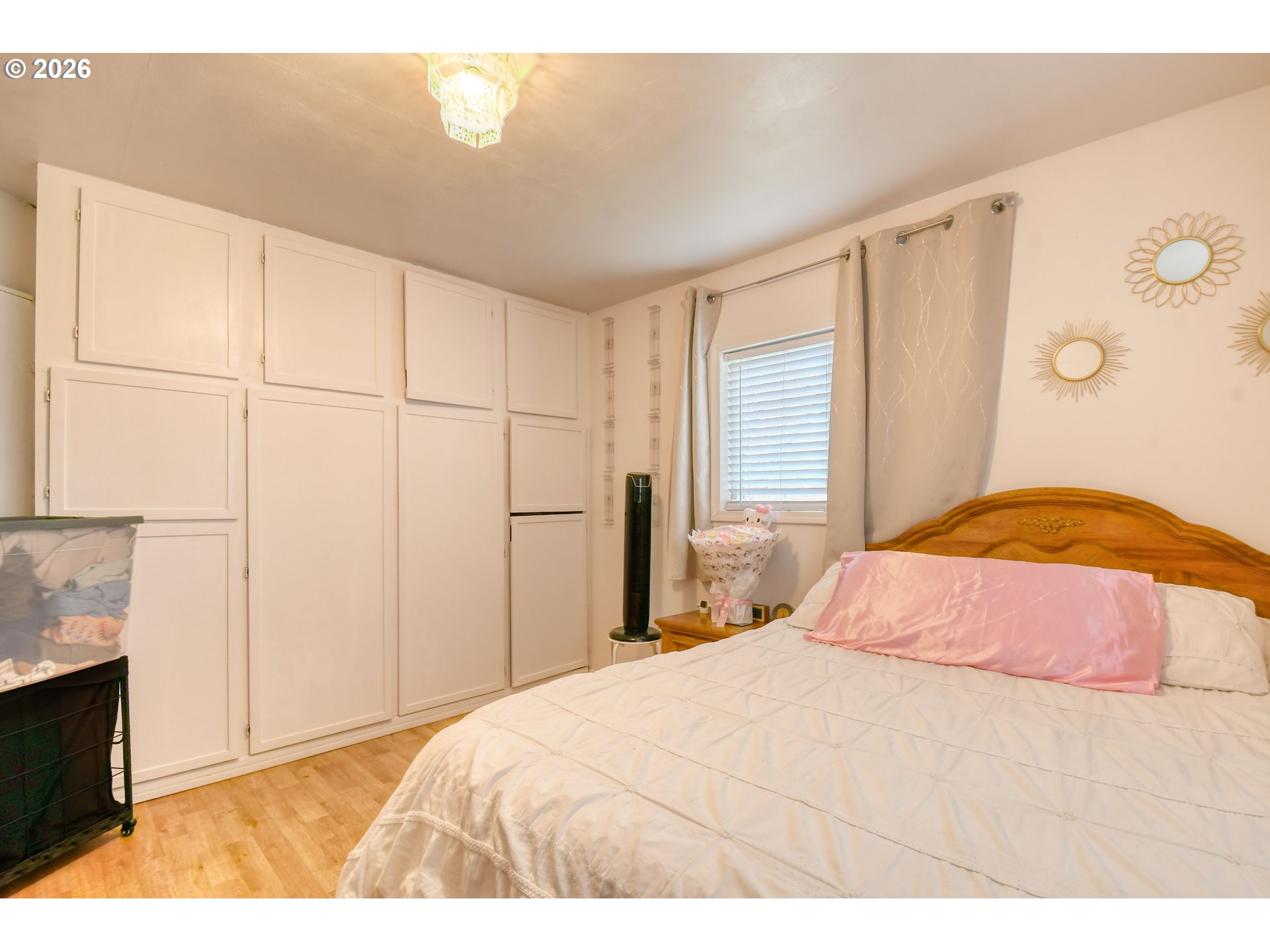 32611 Baxter Road Hermiston, OR 97838 - Photo 18 of 46 a bedroom with a bed and a flat screen tv