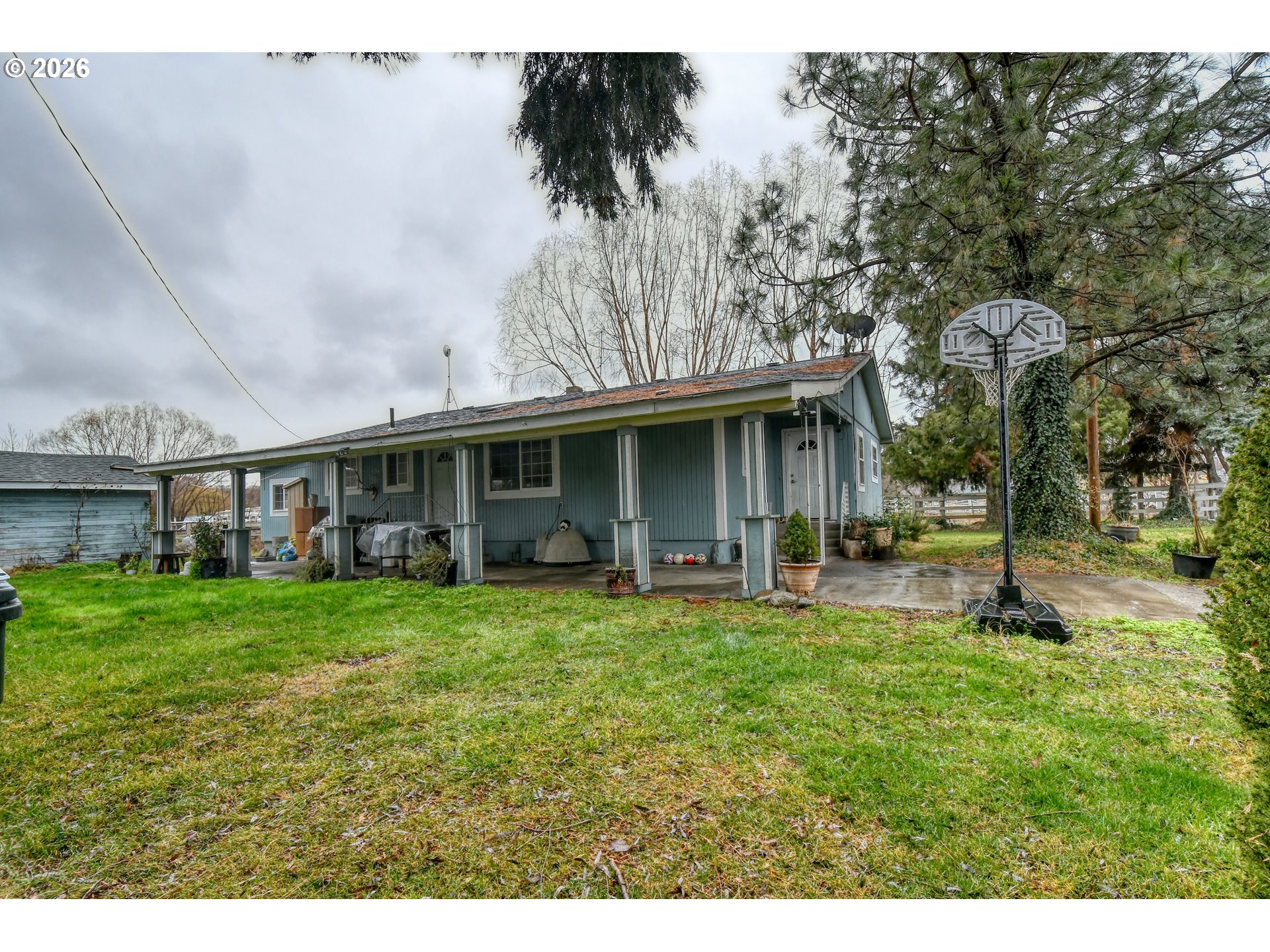 32611 Baxter Road Hermiston, OR 97838 - Photo 2 of 46 a view of a house with a yard and sitting area