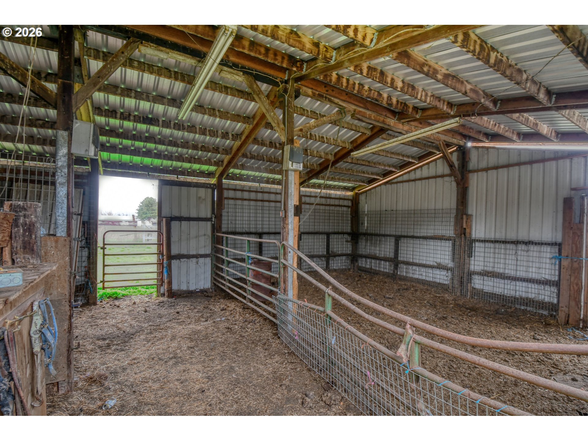 32611 Baxter Road Hermiston, OR 97838 - Photo 35 of 46 a view of an empty room with wooden shelves