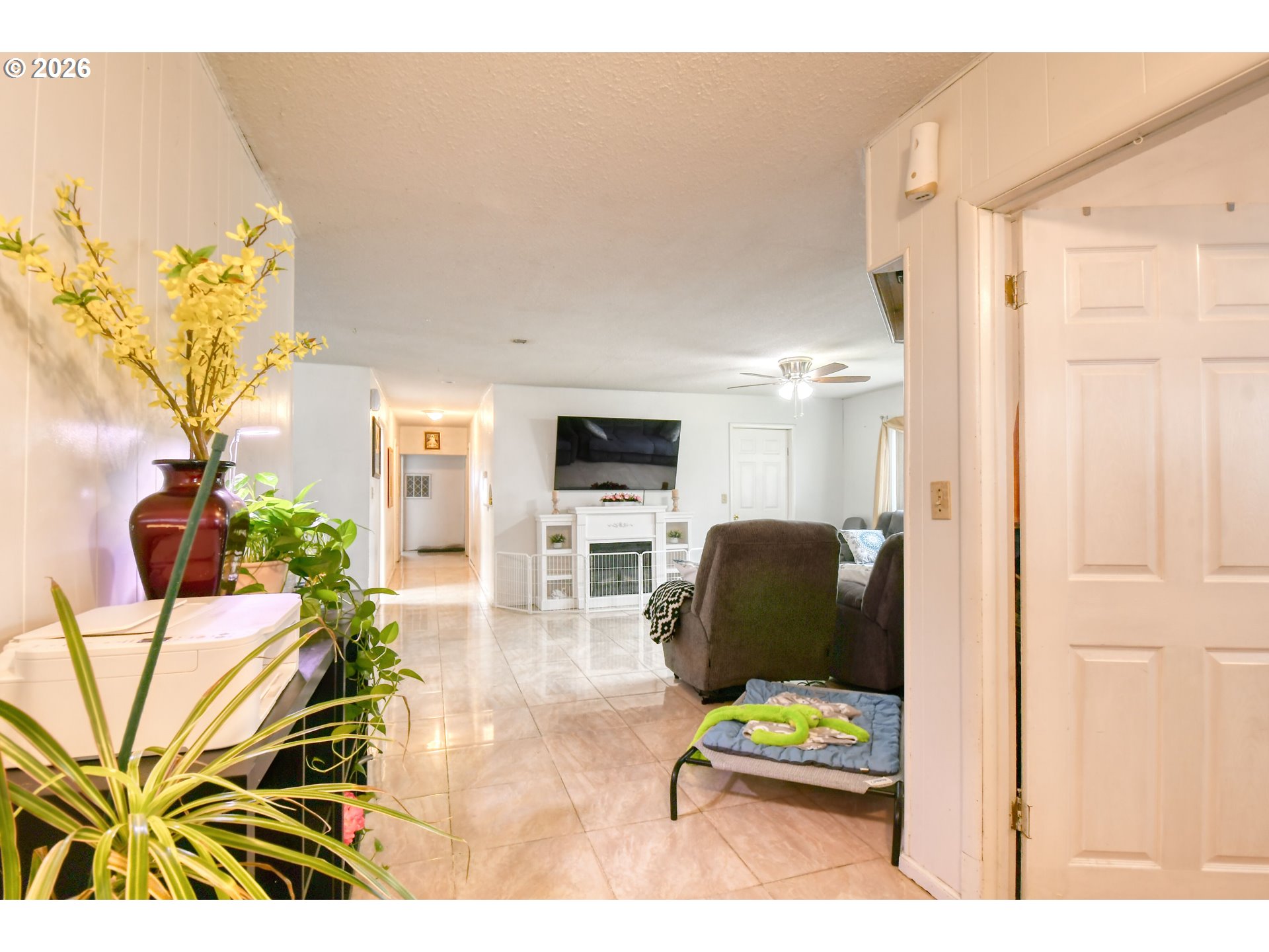 32611 Baxter Road Hermiston, OR 97838 - Photo 6 of 46 a living room with furniture and a flat screen tv
