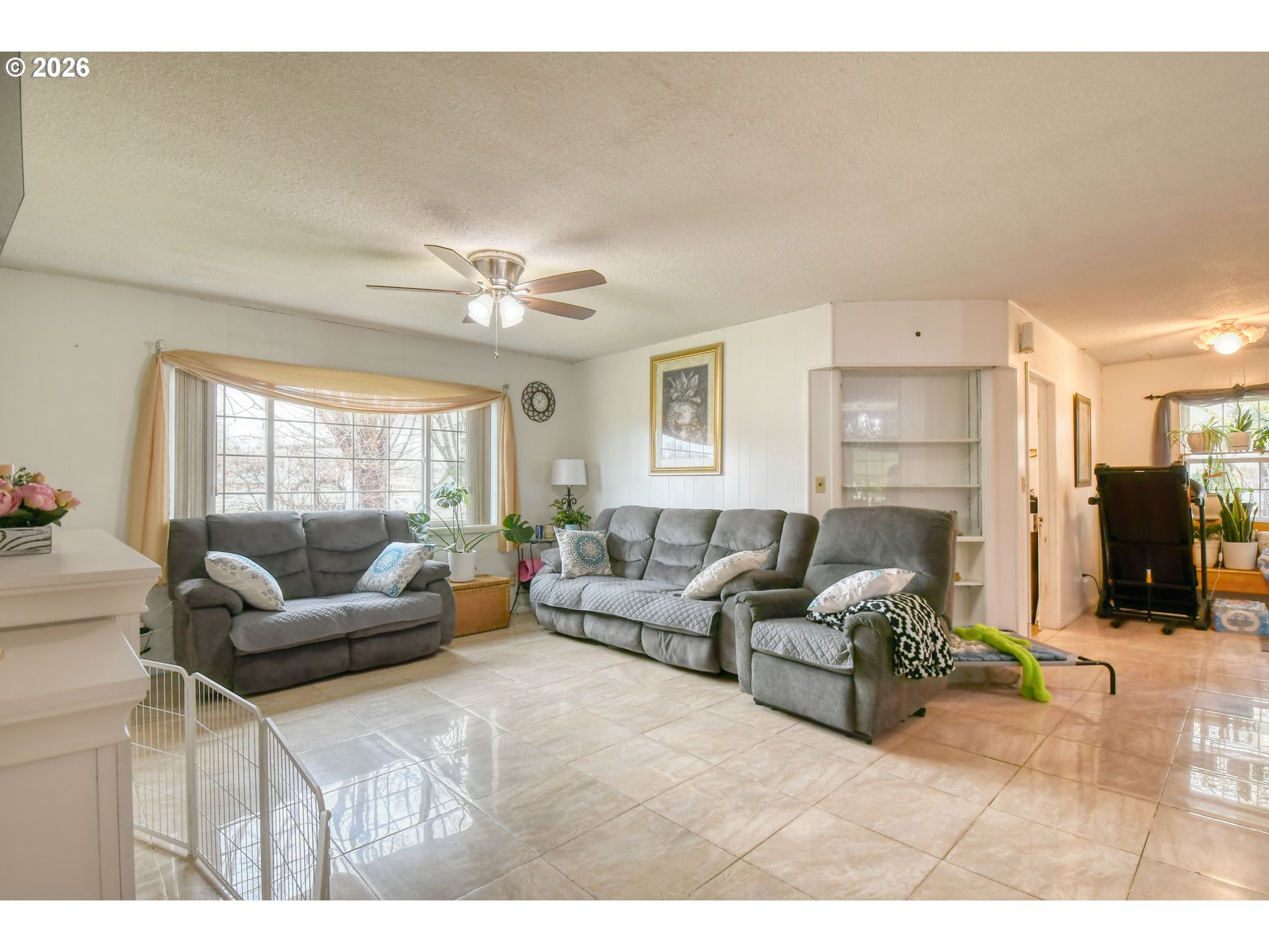 32611 Baxter Road Hermiston, OR 97838 - Photo 7 of 46 a living room with furniture and a large window
