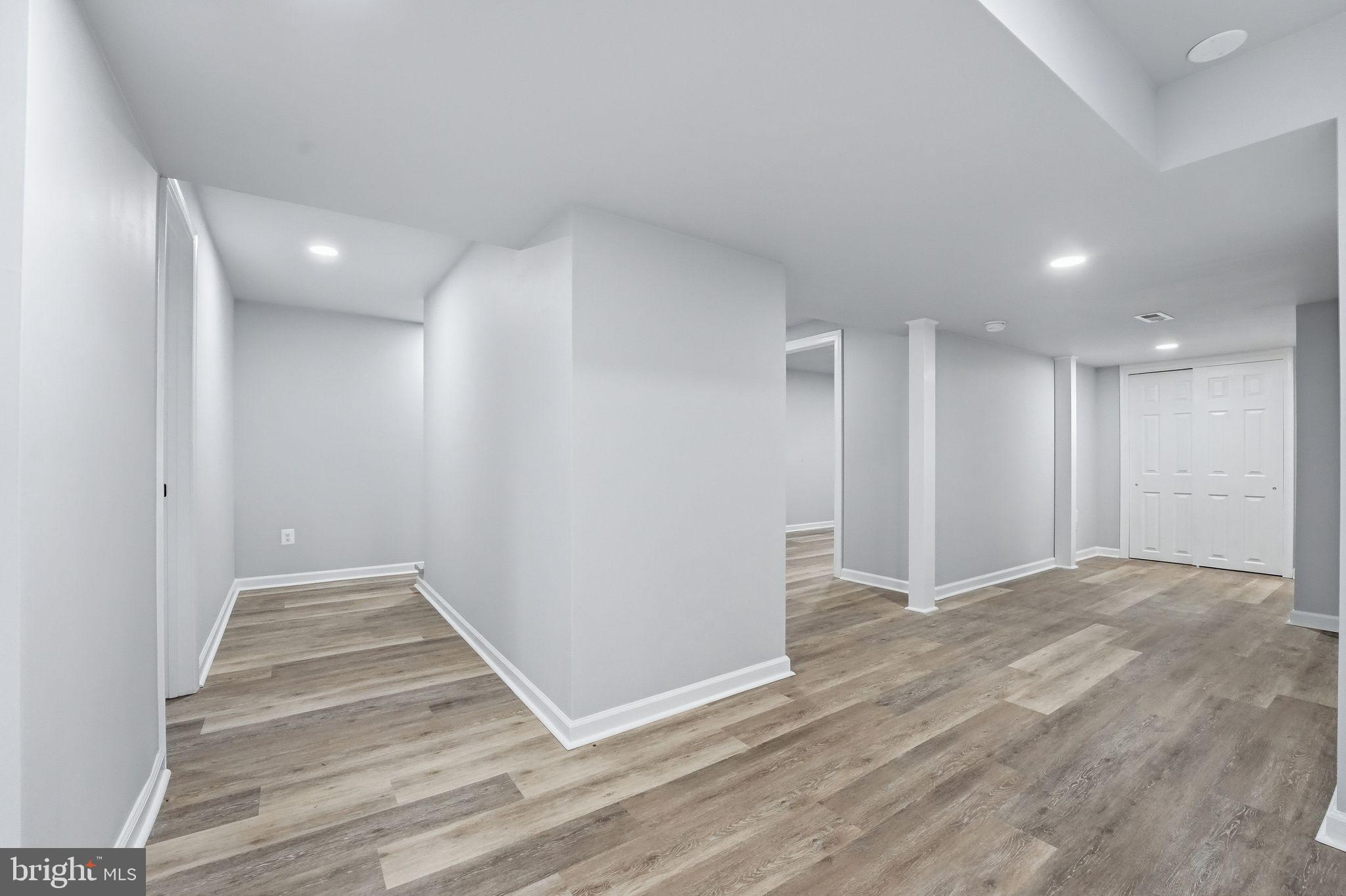 984 Oak Park Road Madison, VA 22727 - Photo 16 of 20 a view of an empty room with wooden floor