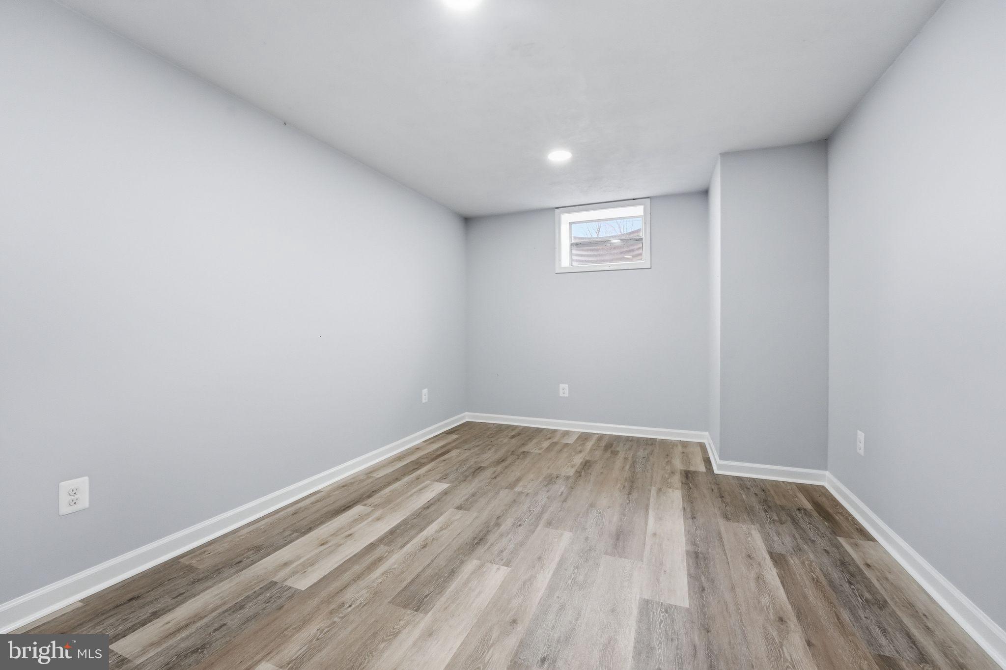 984 Oak Park Road Madison, VA 22727 - Photo 17 of 20 a view of room with wooden floor and window