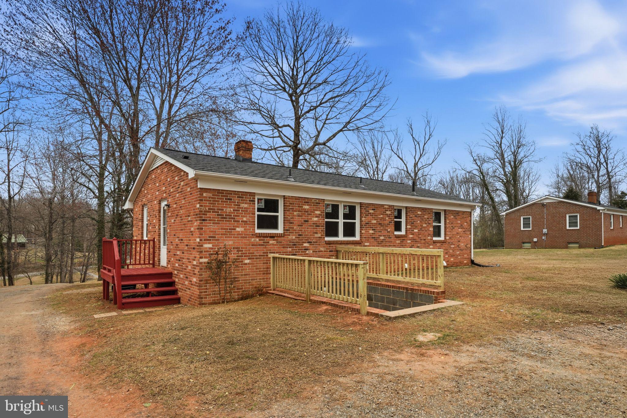 984 Oak Park Road Madison, VA 22727 - Photo 2 of 20 a front view of a house with a yard