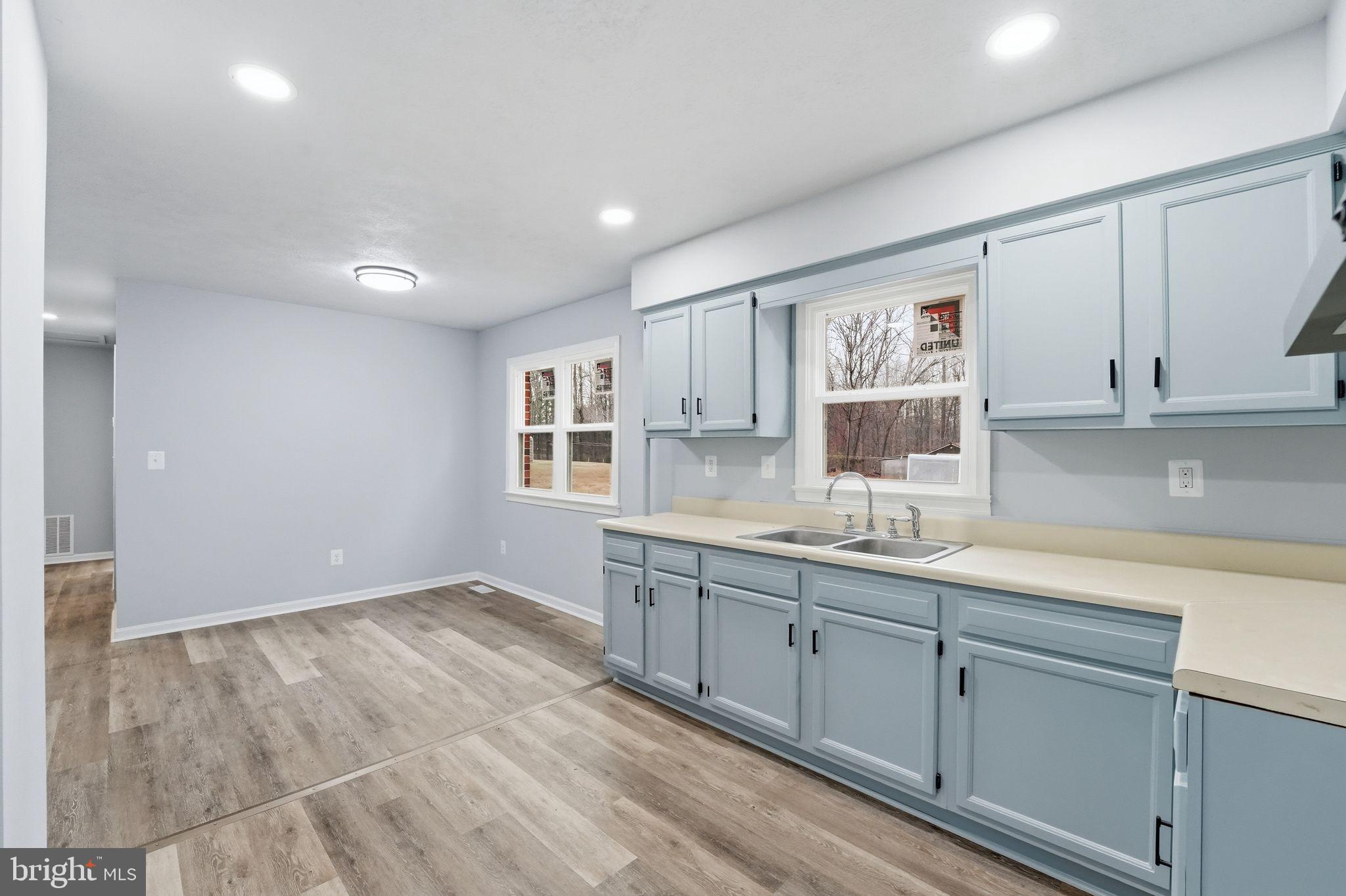 984 Oak Park Road Madison, VA 22727 - Photo 6 of 20 a kitchen with sink and cabinets