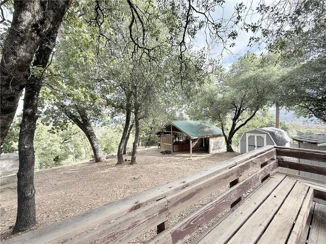 a view of a backyard of the house