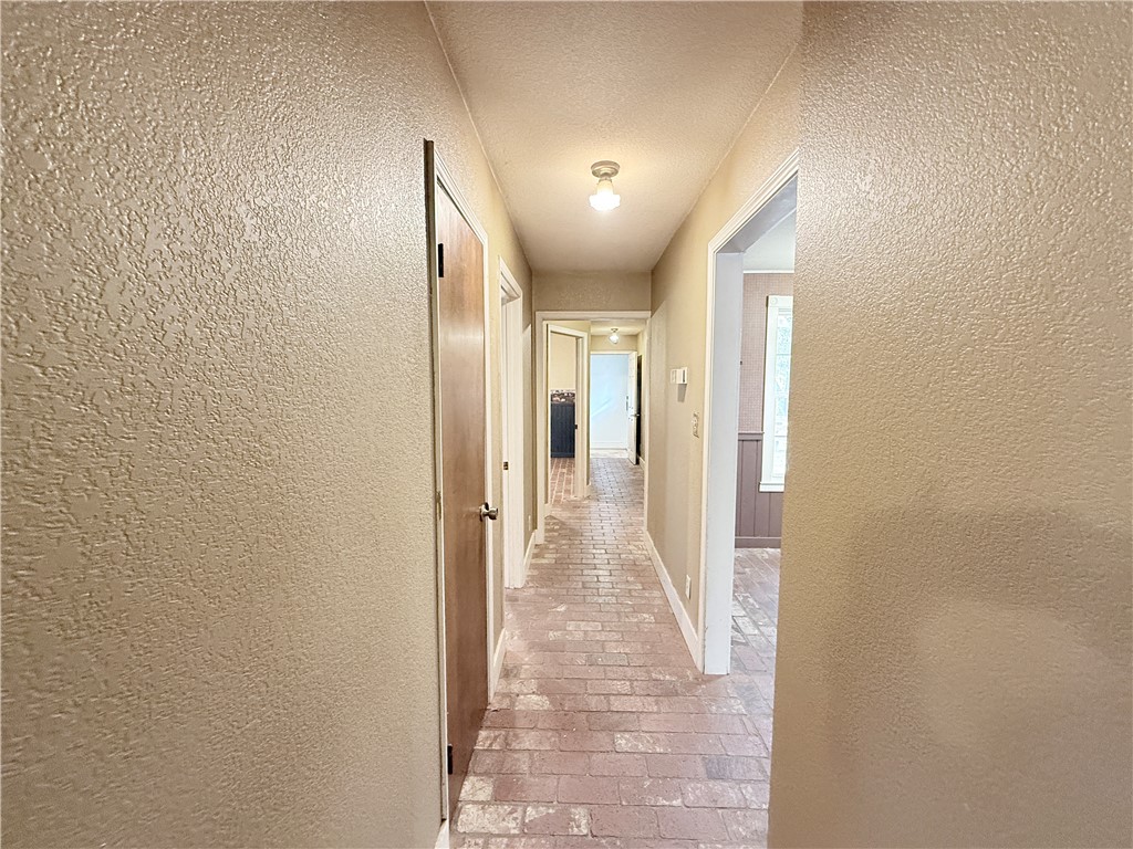 5264 Davis Road Midpines, CA 95345 - Photo 32 of 48 a view of a hallway with wooden floor