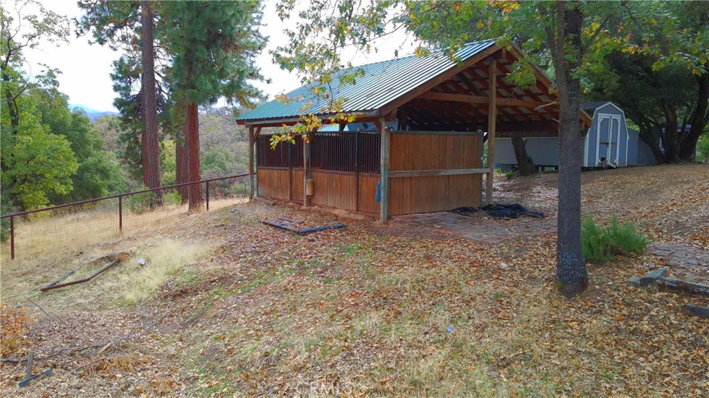 5264 Davis Road Midpines, CA 95345 - Photo 7 of 48 a view of a house with a back yard