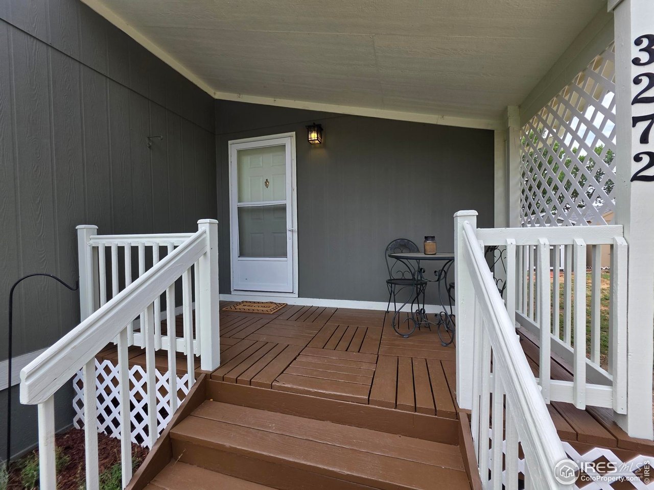 3272 North Rim, Unit 136 Longmont, CO 80504 - Photo 5 of 38 a view of entryway with wooden floor