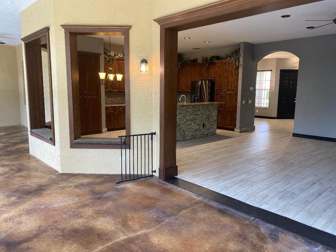 7907 Emerald Winds Circle Boynton Beach, FL 33473 - Photo 22 of 39 a view of a room with wooden floor and entryway