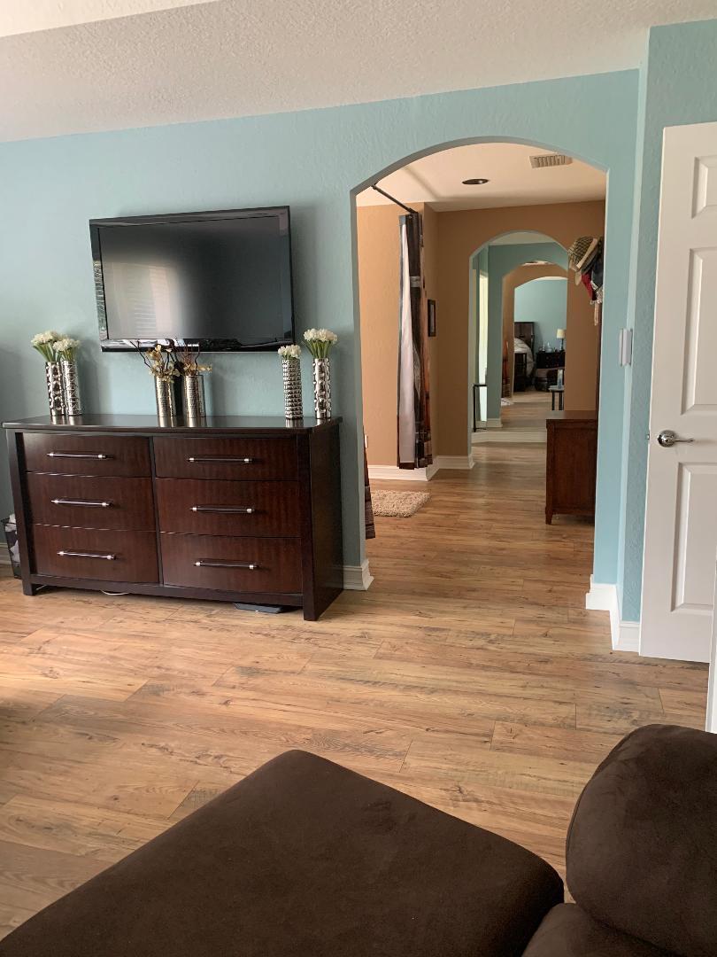7907 Emerald Winds Circle Boynton Beach, FL 33473 - Photo 31 of 39 a view of living room with furniture and flat screen tv