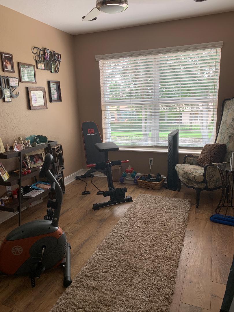 7907 Emerald Winds Circle Boynton Beach, FL 33473 - Photo 32 of 39 a living room with furniture and a large window