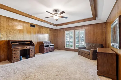 a view of livingroom with furniture and a ceiling fan