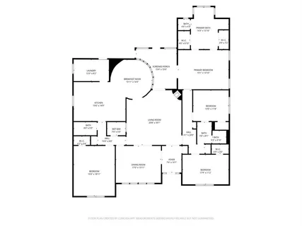 a view of a house with a tree in front of it