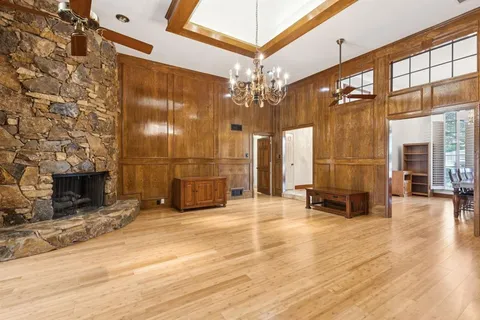 a view of a hall with many windows