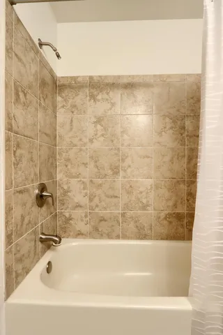 a bathroom with a bathtub