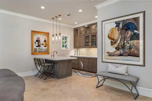 a spacious bedroom with a bed and a window