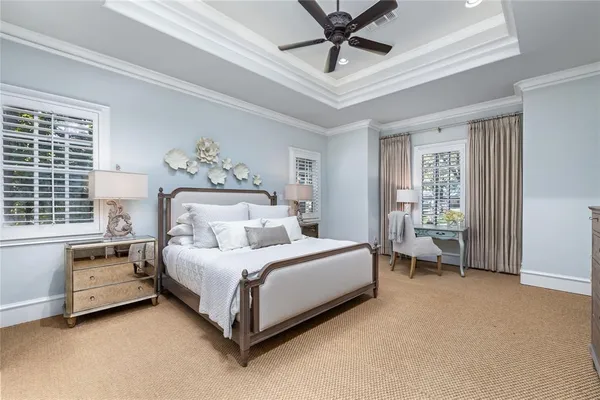 a bathroom with a double vanity sink mirror and shower