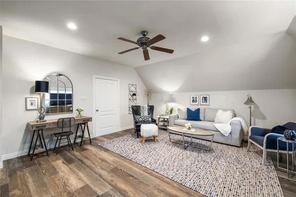 a front view of houses with yard