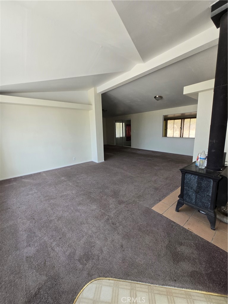 12285 Golden View Road Pinon Hills, CA 92372 - Photo 12 of 21 a living room with furniture and a window