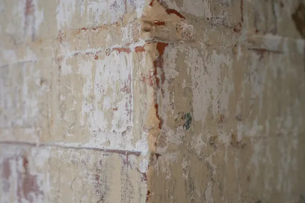 a living room with furniture a flat screen tv and a window