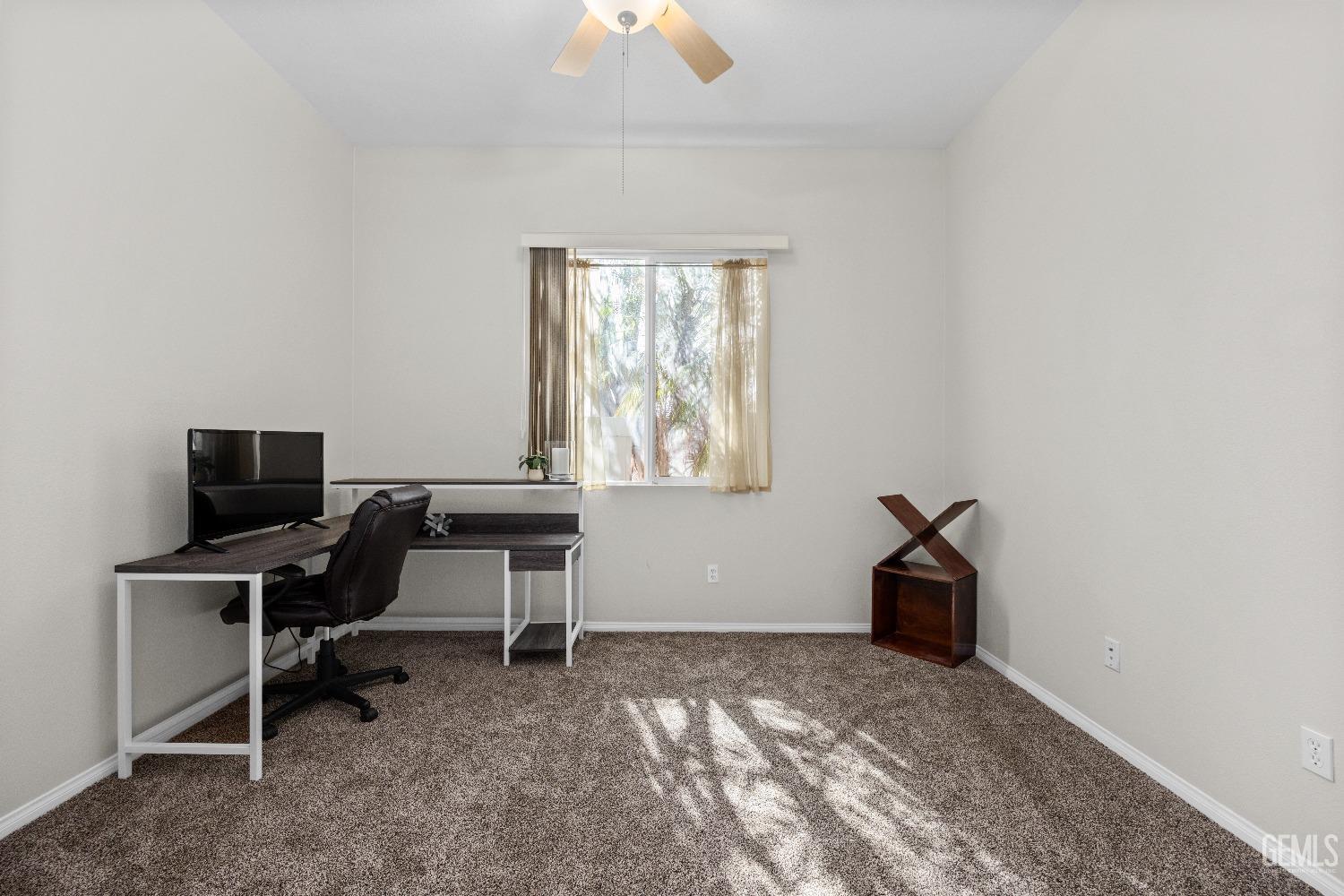Undisclosed Address Bakersfield, CA 93306 - Photo 20 of 24 a workspace with furniture and a window